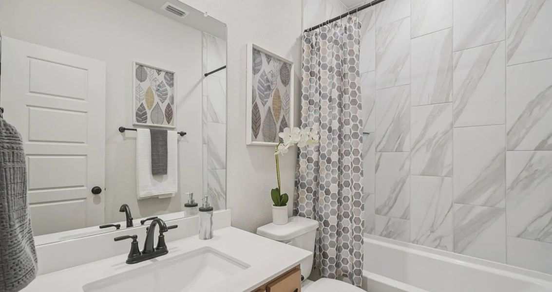 Furnished interior view inside a new home in Stream Waters, Buda (Image 14).
