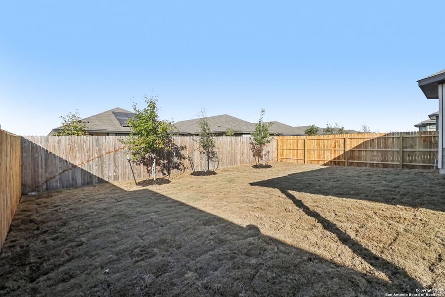 Exterior details and patio area of a home in Catalina, Converse (Image 26).