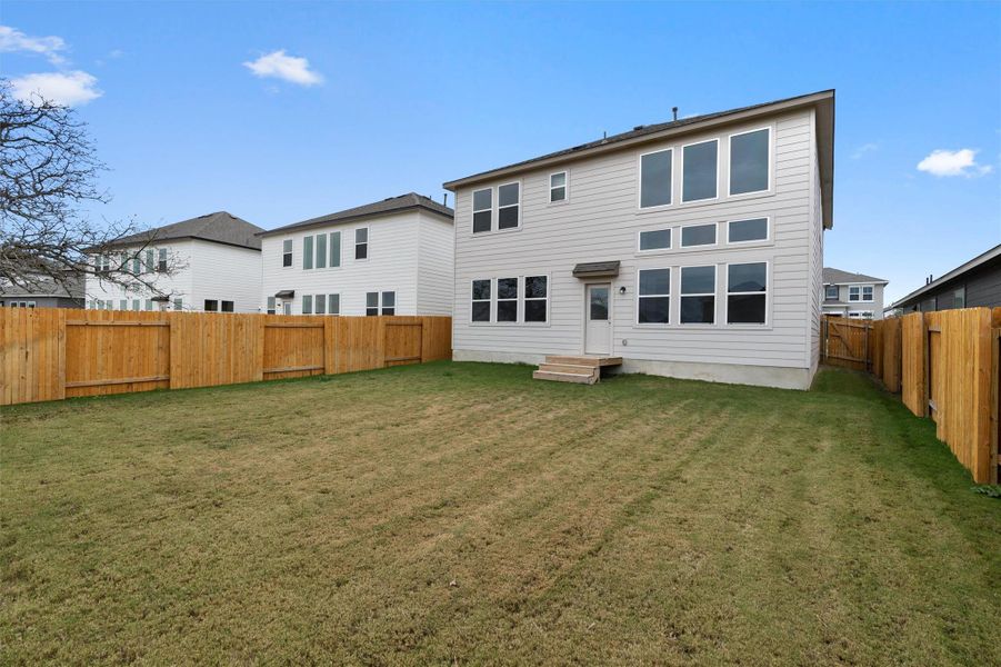 Exterior details and patio area of a home in Morningstar, Georgetown (Image 2).