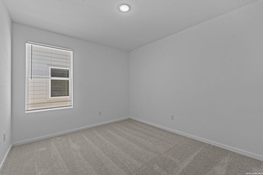 Spacious, unfurnished interior of a new home in Guadalupe Ridge, New Braunfels (Image 14).