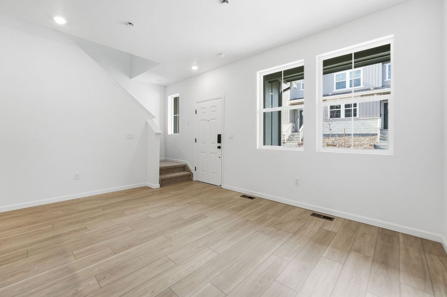 Spacious, unfurnished interior of a new home in Trailstone, Arvada (Image 22).