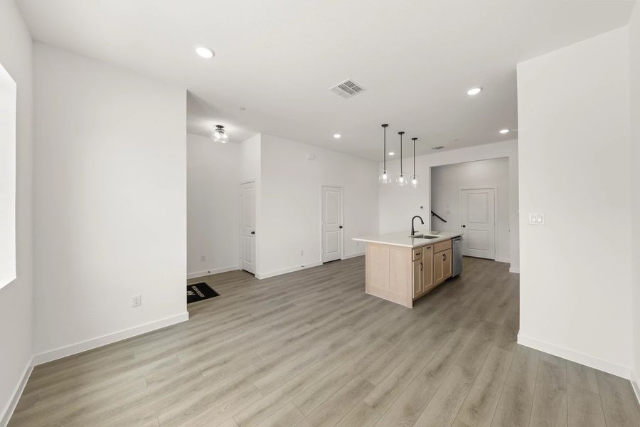 Open Kitchen-Living-Dining Room featuring the Artisan Collection