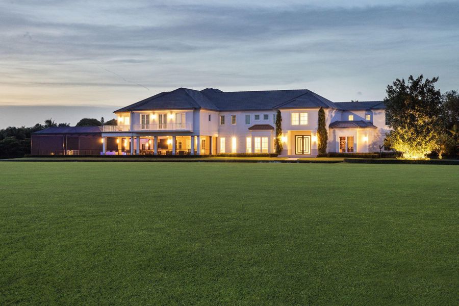 Front exterior of a new home in , Wellington, FL, highlighting curb appeal (Image 26). Front exterior of a new home in , Wellington, FL, highlighting curb appeal (Image 26).