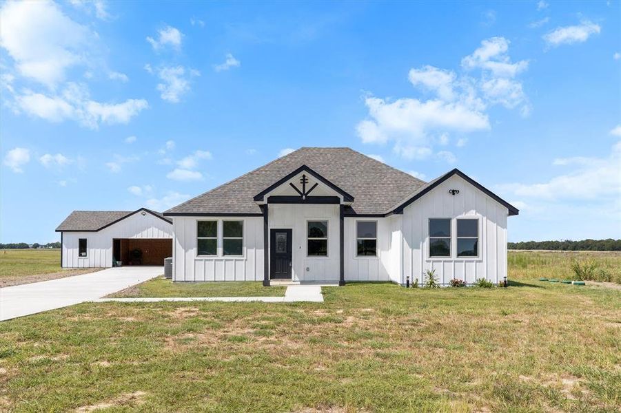 Front exterior of a new home in , Commerce, TX, highlighting curb appeal (Image 19). Front exterior of a new home in , Commerce, TX, highlighting curb appeal (Image 19).