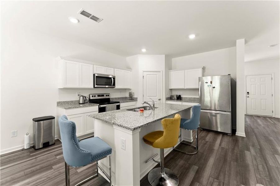 Furnished interior view inside a new home in Meriwether Place, Villa Rica (Image 11).