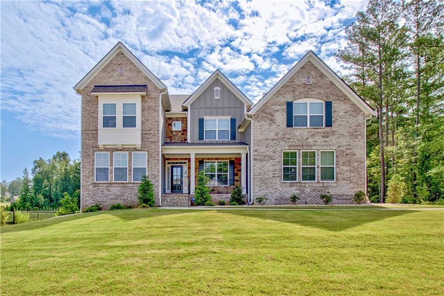 Front exterior of a new home in Genesee, Newnan, GA, highlighting curb appeal (Image 23).