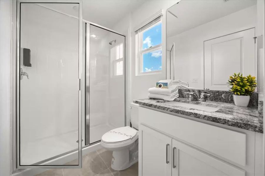Furnished interior view inside a new home in Solara Resort, Kissimmee (Image 28).