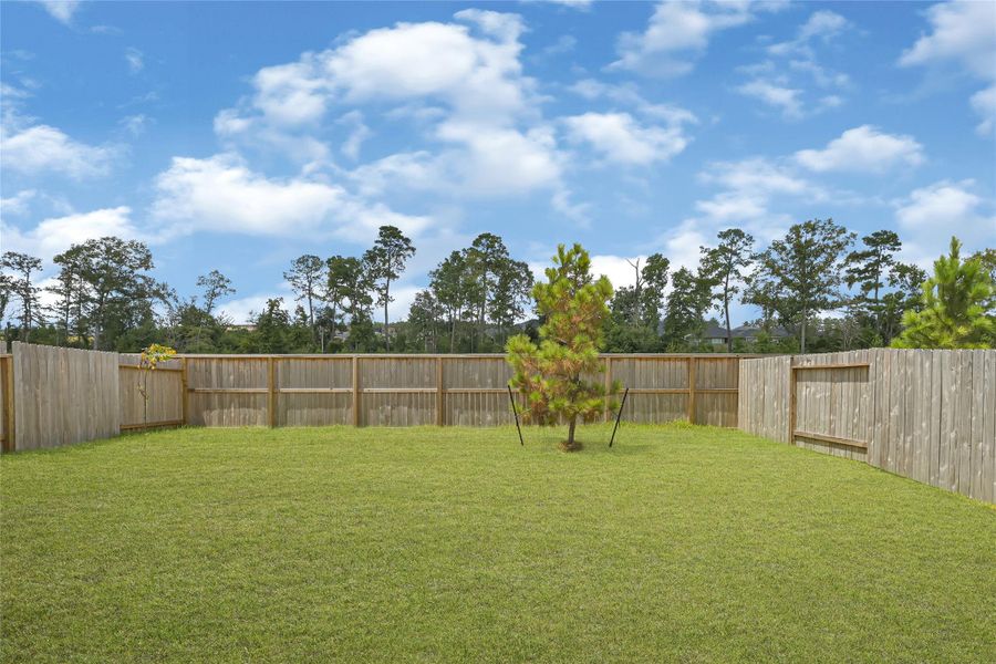 Exterior details and patio area of a home in Presswoods, Splendora (Image 4).