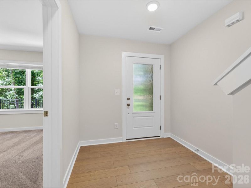 Spacious, unfurnished interior of a new home in Central Living at Craig, Charlotte (Image 17).
