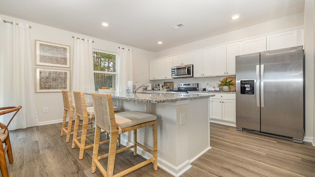 Furnished interior view inside a new home in Harper Meadows, Loris (Image 6).