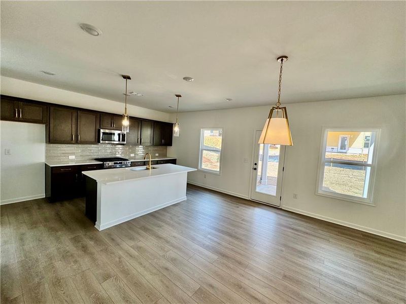 Furnished interior view inside a new home in Eastlyn Crossing, Flowery Branch (Image 7).