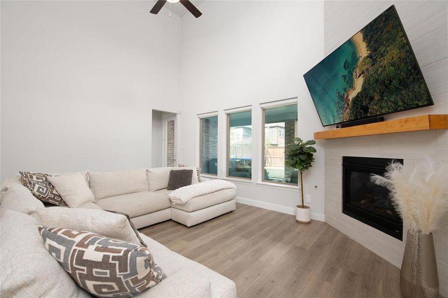 A gas log fireplace creates a warm focal point, adding comfort and character to this inviting living space. A gas log fireplace creates a warm focal point, adding comfort and character to this inviting living space.