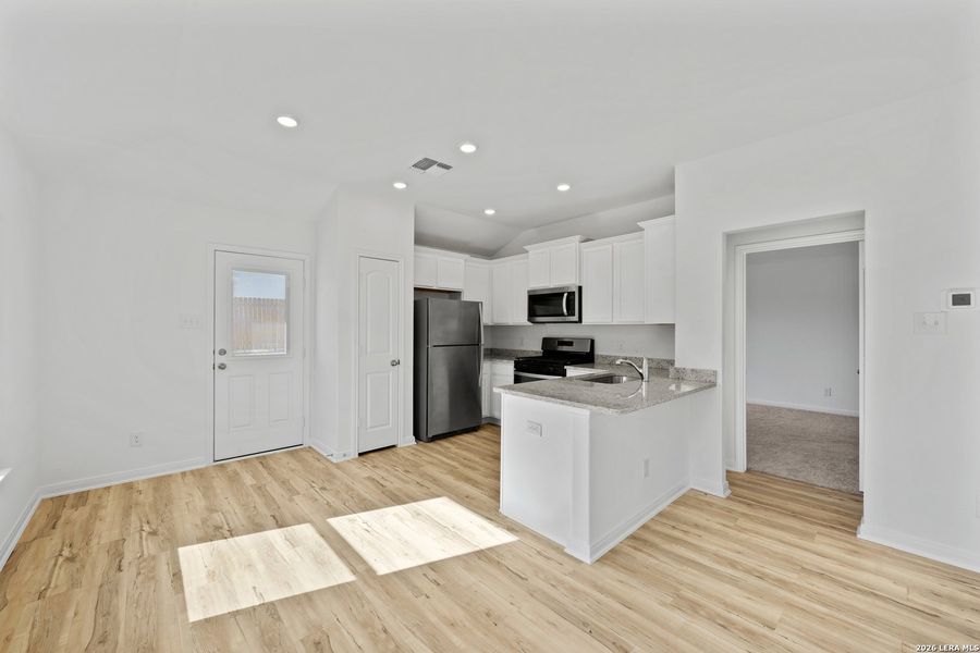 Furnished interior view inside a new home in Preserve at Medina, Von Ormy (Image 7).