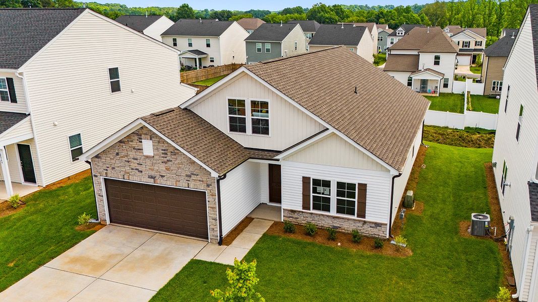 Front exterior of a new home in Hanes Lake, Winston-Salem, NC, highlighting curb appeal (Image 24).