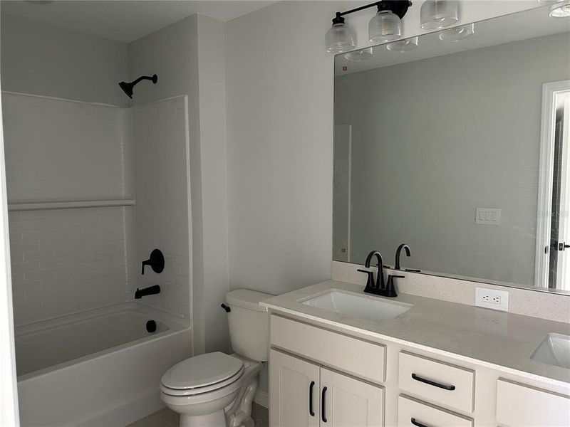 In-progress construction of a new home in Oakfield Trails Signature, Parrish, FL (Image 9). In-progress construction of a new home in Oakfield Trails Signature, Parrish, FL (Image 9).