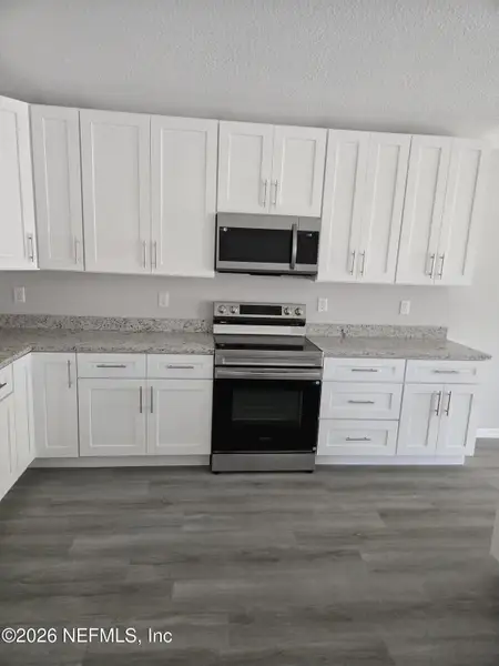 Furnished interior view inside a new home in , Jacksonville (Image 9). Furnished interior view inside a new home in , Jacksonville (Image 9).