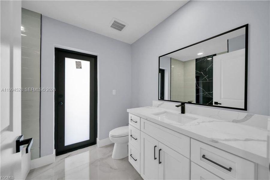 Furnished interior view inside a new home in , Lehigh Acres (Image 17). Furnished interior view inside a new home in , Lehigh Acres (Image 17).