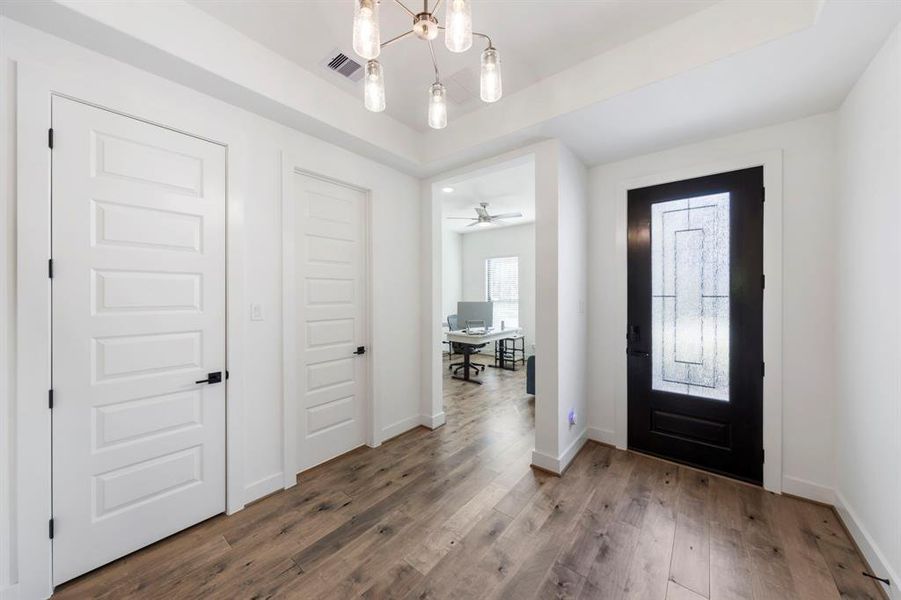 At the front of the home, you'll find a private study, a convenient half bath, and a spacious closet for added storage.