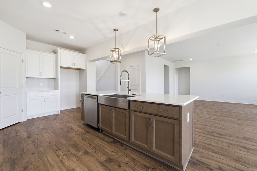 Furnished interior view inside a new home in Aden Woods, Fairview (Image 9).