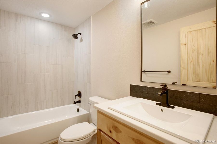 Full bath on lower level Full bath on lower level