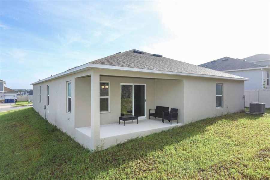 Exterior details and patio area of a home in The Reserve at Lake Ridge II, Minneola (Image 22).