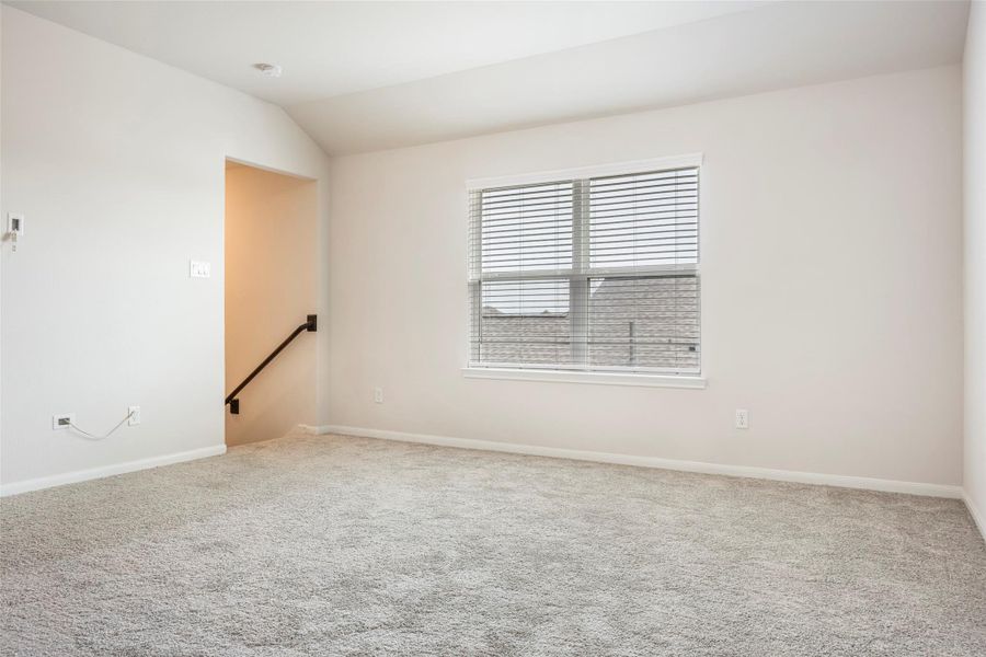 Spacious, unfurnished interior of a new home in Sunterra, Katy (Image 25).