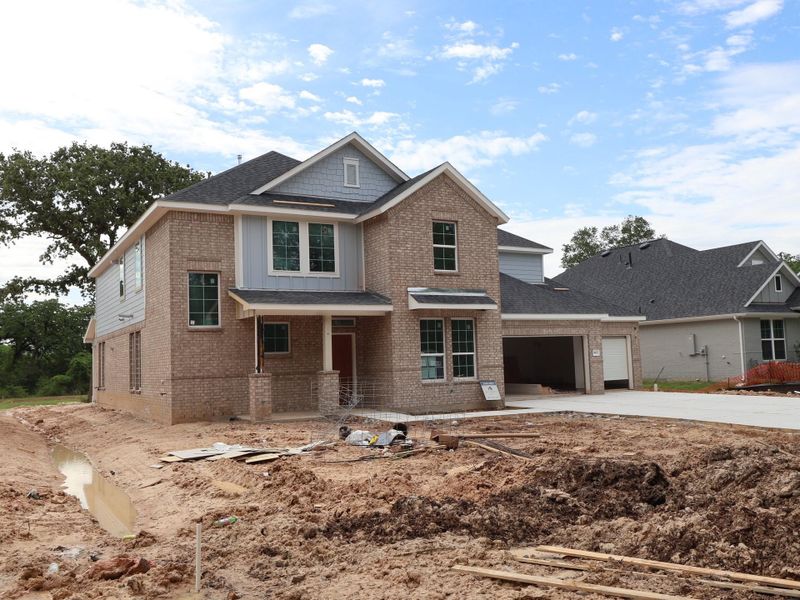 In-progress construction of a new home in The Oaks on 6th Street, Magnolia, TX (Image 12).