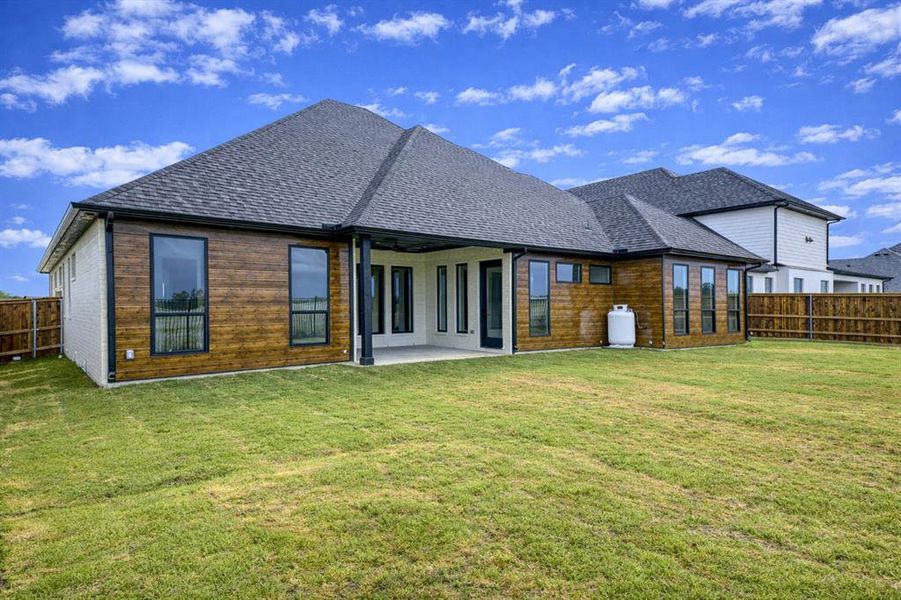 Exterior details and patio area of a home in , Pottsboro (Image 3).