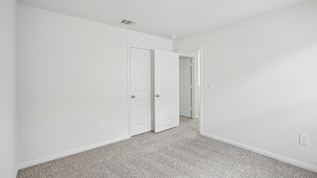 Spacious, unfurnished interior of a new home in Bar W Ranch, Leander (Image 31).
