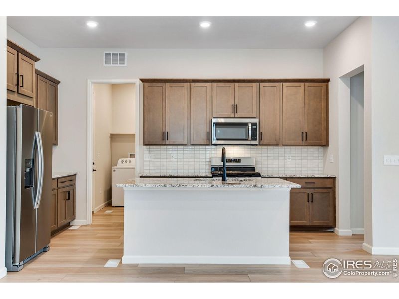 Furnished interior view inside a new home in Westside Crossing Paired Homes, Berthoud (Image 9). Furnished interior view inside a new home in Westside Crossing Paired Homes, Berthoud (Image 9).