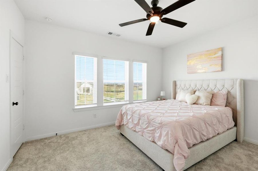 Furnished interior view inside a new home in Pecan Square - Gardens, Northlake (Image 33). Furnished interior view inside a new home in Pecan Square - Gardens, Northlake (Image 33).