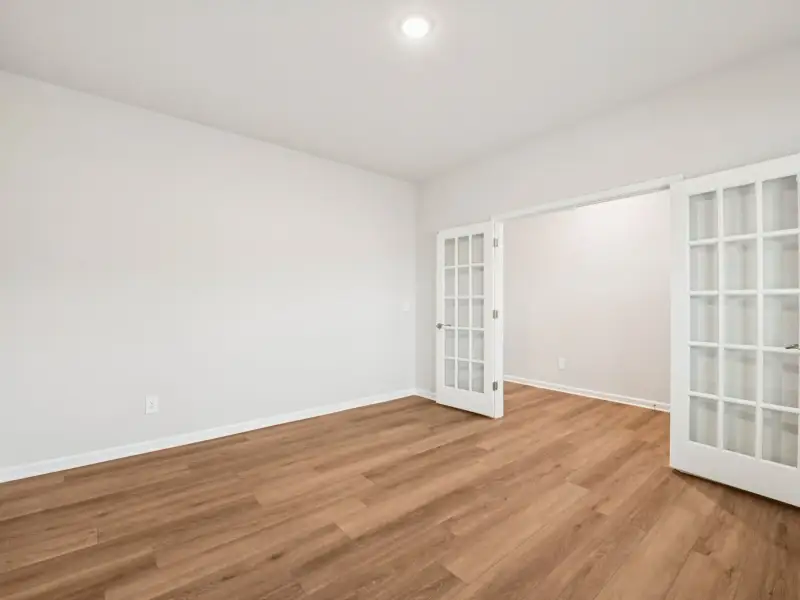 Spacious, unfurnished interior of a new home in Country Lane - Signature Series, Clayton (Image 13).