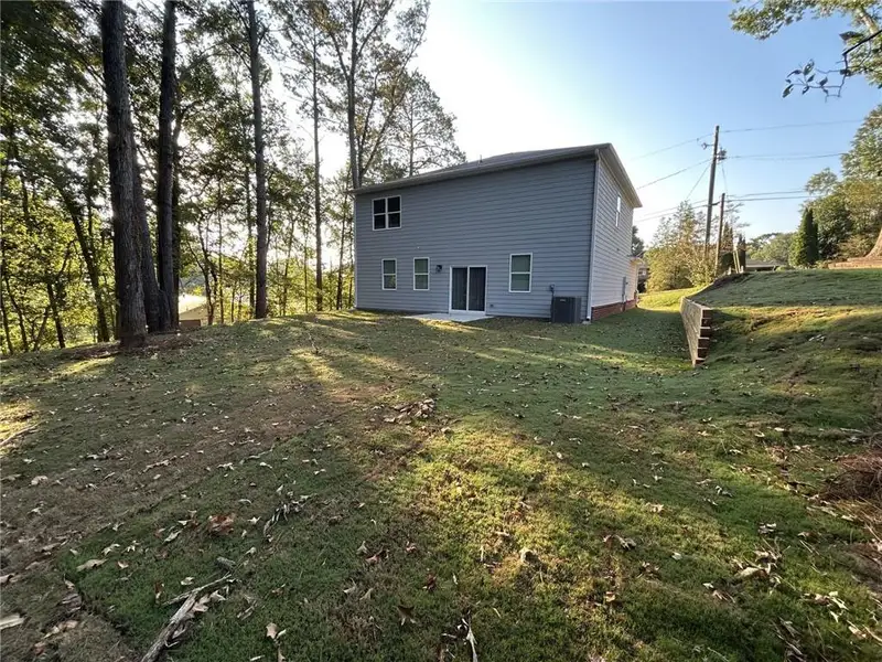 Exterior details and patio area of a home in , Cartersville (Image 16).