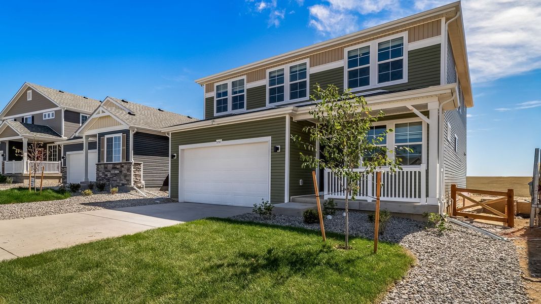 Front exterior of a new home in Banning Lewis Ranch, Colorado Springs, CO, highlighting curb appeal (Image 22).