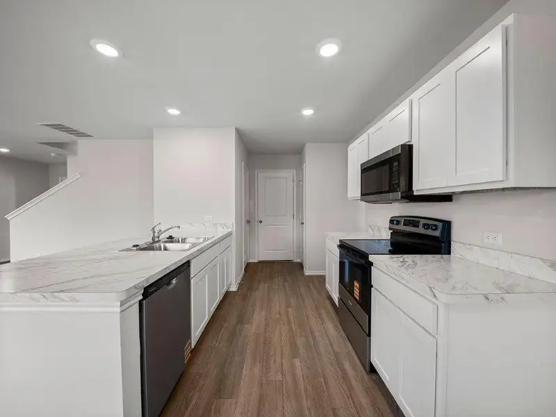 Furnished interior view inside a new home in Stoney Ridge, Hudson (Image 5).