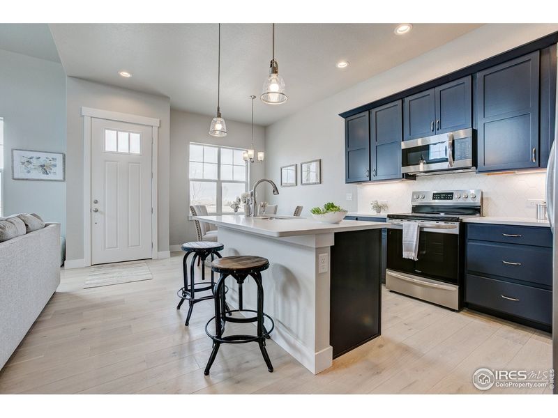 Furnished interior view inside a new home in The Lakes at Centerra - The Shores, Loveland (Image 10).