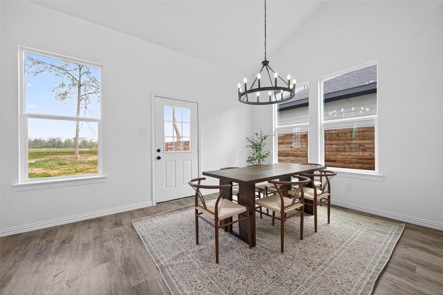Bright dining area conveniently located next to the kitchen and living room.