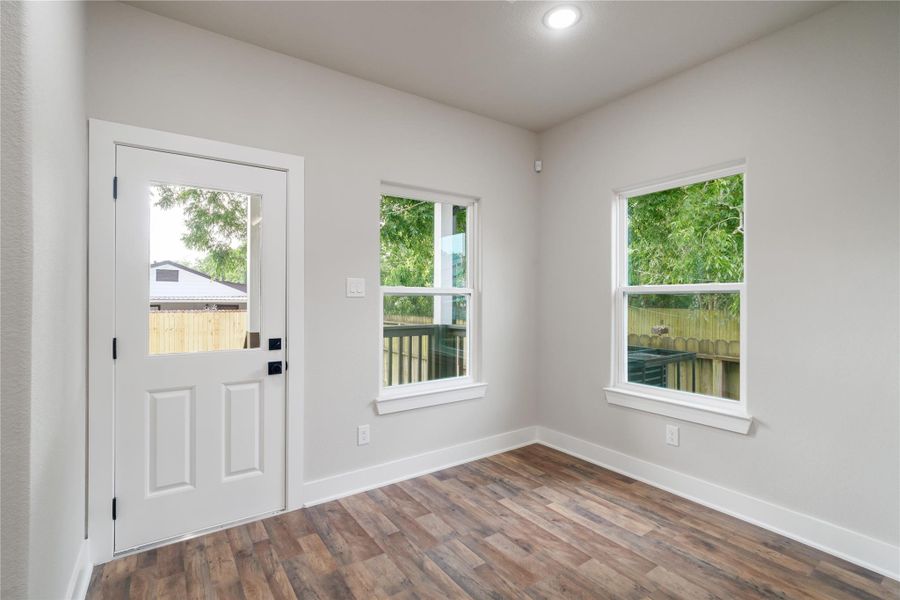 Your breakfast area is surrounded by two large windows offering tons of natural light and perfect view of your large backyard and covered back porch Your breakfast area is surrounded by two large windows offering tons of natural light and perfect view of your large backyard and covered back porch