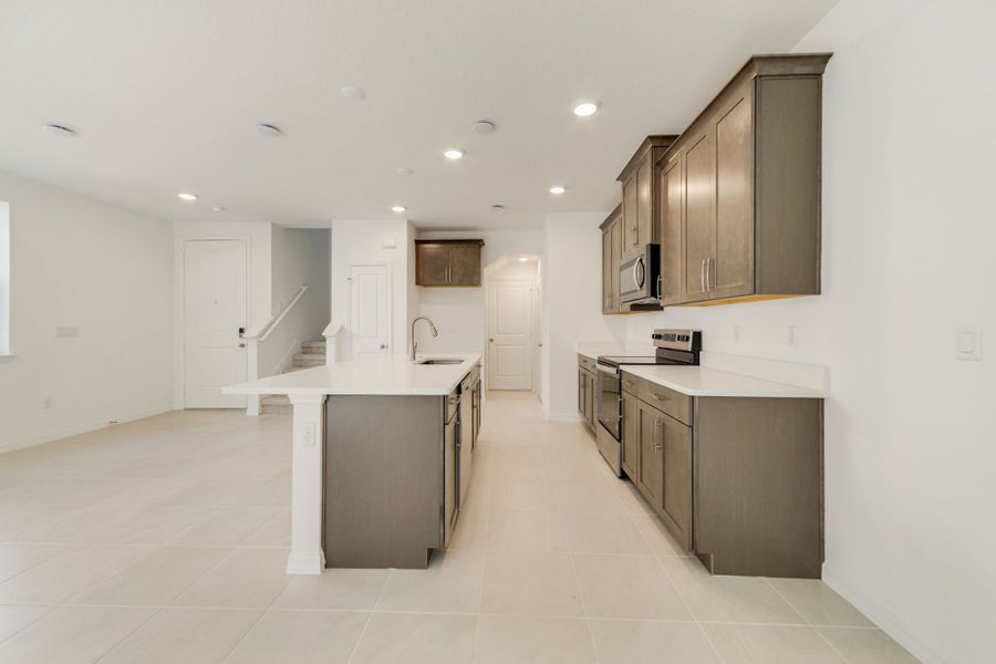 Furnished interior view inside a new home in Towns at Greenleaf, Oviedo (Image 6).