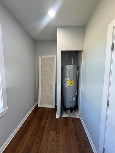 Utilities featuring water heater Utilities featuring water heater