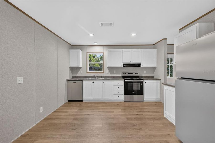 Furnished interior view inside a new home in , Wildwood (Image 8).