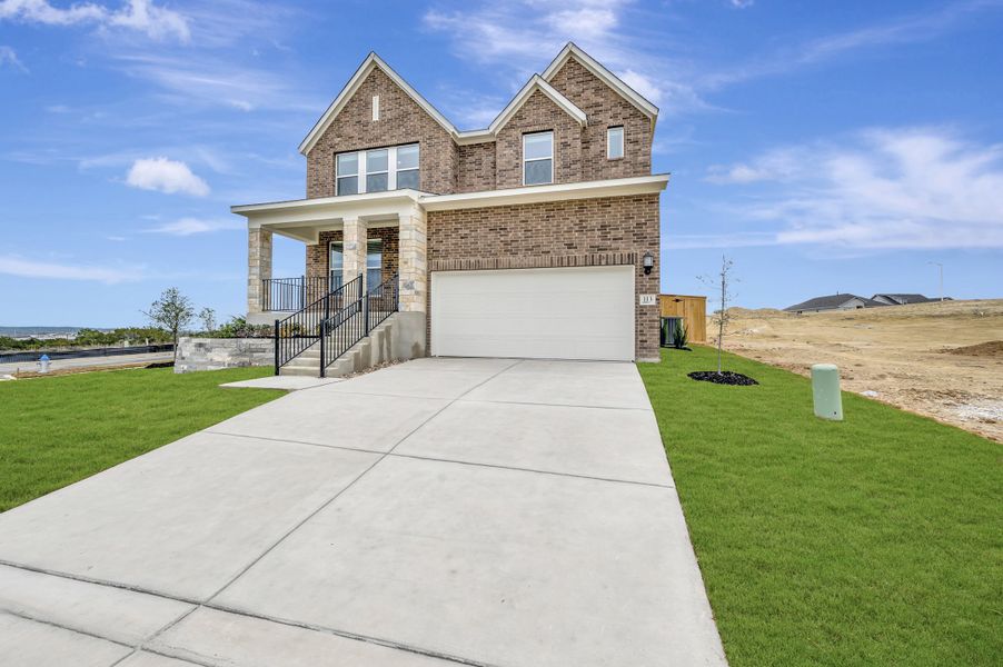 Front exterior of a new home in Mayfair - Select Classic Series, New Braunfels, TX, highlighting curb appeal (Image 25).