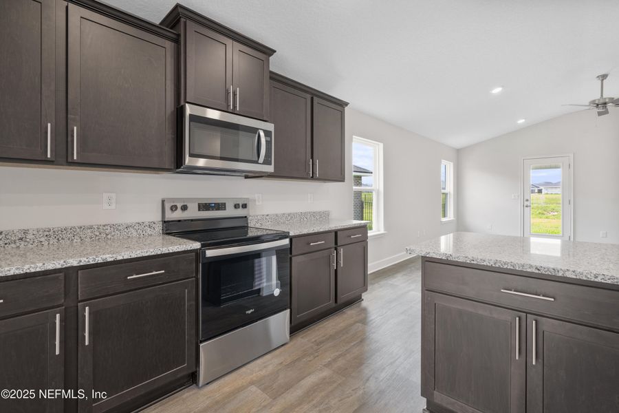 Furnished interior view inside a new home in Shadow Crest at Rolling Hills, Green Cove Springs (Image 12). Furnished interior view inside a new home in Shadow Crest at Rolling Hills, Green Cove Springs (Image 12).