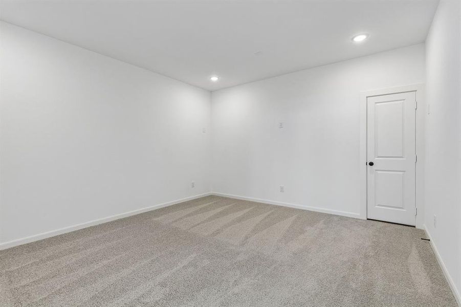 The spacious media room paired with adjacent game room creates the ultimate family entertainment zone!