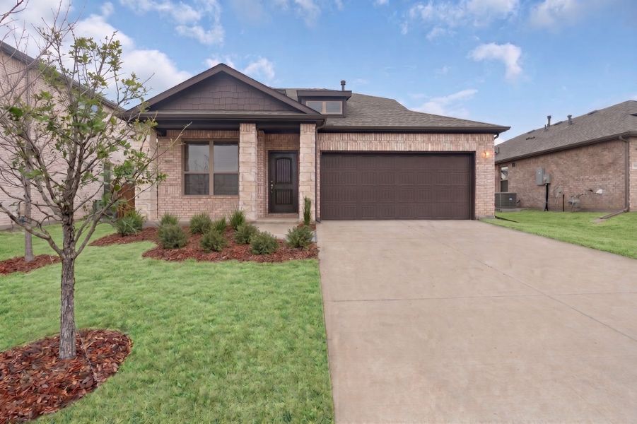 Front exterior of a new home in Stonecreek, Sulphur Springs, TX, highlighting curb appeal (Image 1). Front exterior of a new home in Stonecreek, Sulphur Springs, TX, highlighting curb appeal (Image 1).