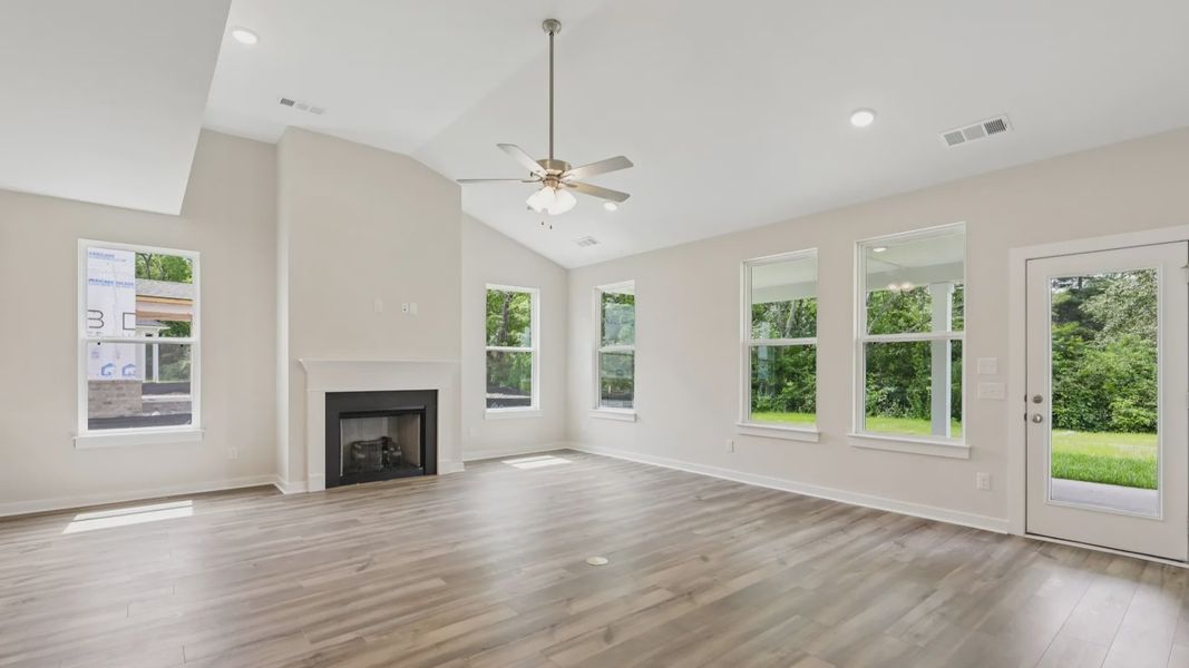 Gathering room with high ceilings and natural light from windows