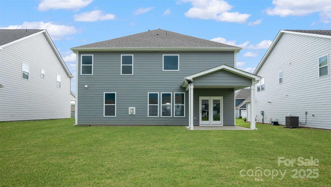 Photo is representative but rear patio is covered.