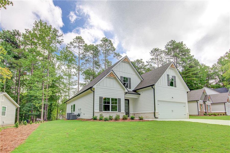 Front exterior of a new home in , Villa Rica, GA, highlighting curb appeal (Image 28).