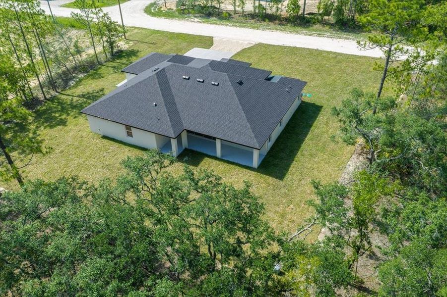 Front exterior of a new home in , Weeki Wachee, FL, highlighting curb appeal (Image 35). Front exterior of a new home in , Weeki Wachee, FL, highlighting curb appeal (Image 35).