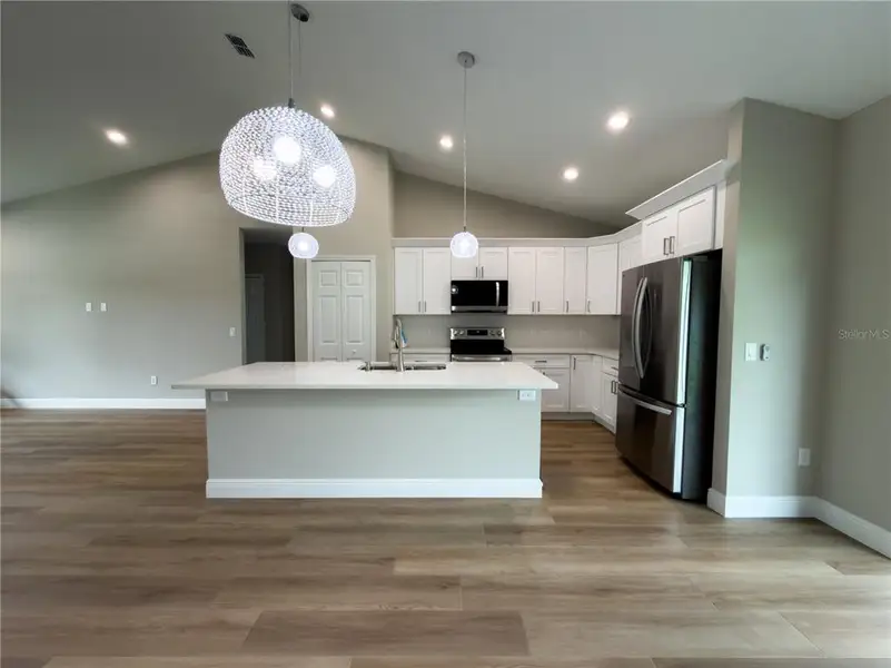 Furnished interior view inside a new home in , Deltona (Image 6).